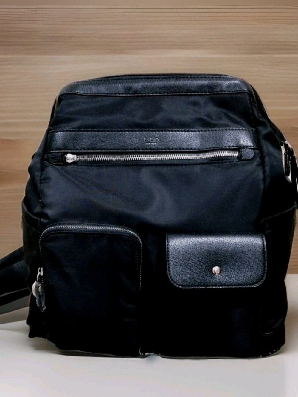 Tutilo Black Nylon Backpack with Leather Trim and Front Pockets